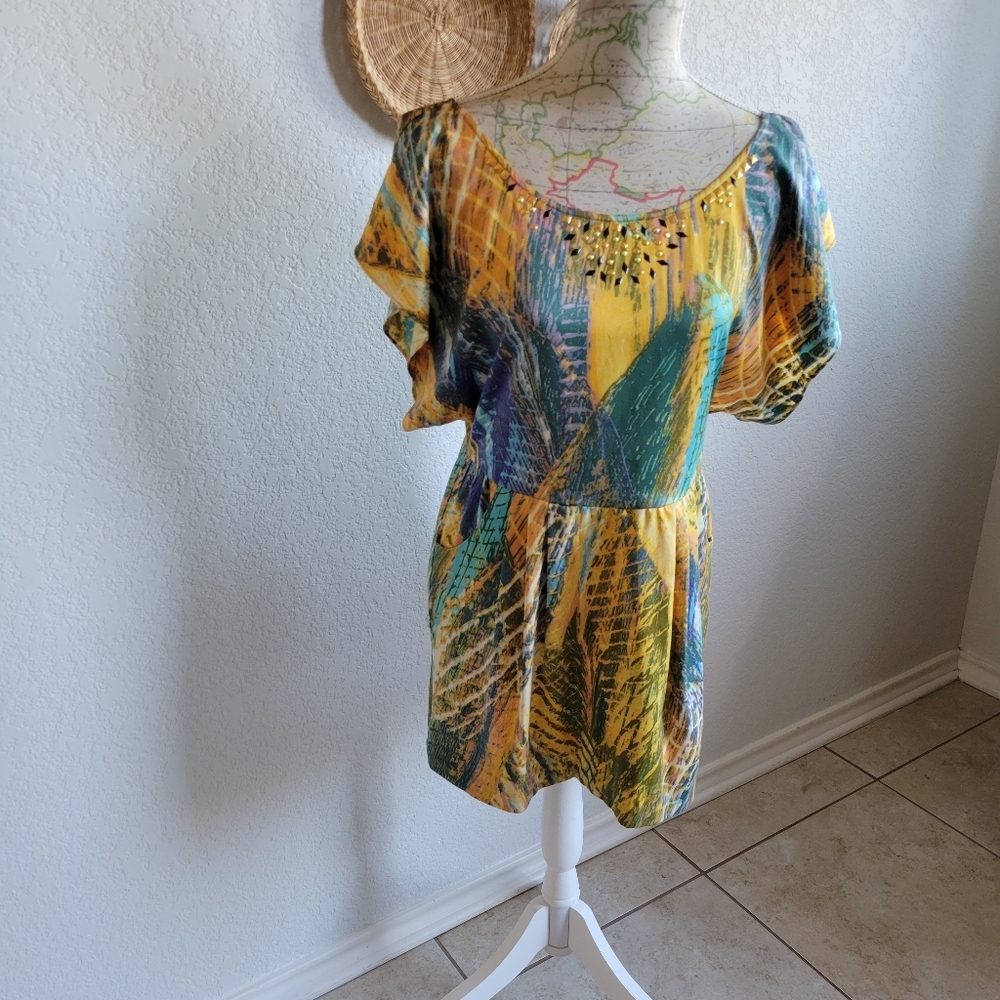Free People mini dress, super cute, sheer button up back. Size 4, EUC, like new
